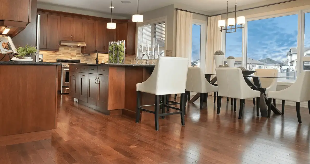 A modern kitchen with professionally installed wood flooring in Long Beach, CA