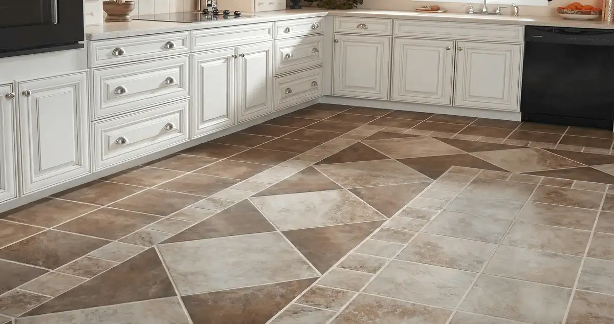 Kitchen with white cabinets and a professionally installed tile floor in Long Beach, CA