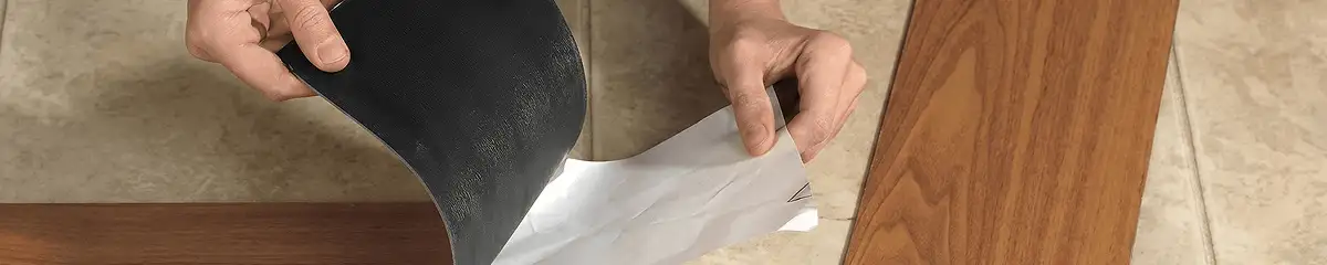 A professional installing vinyl flooring in Long Beach, CA